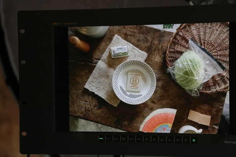 Shooting the Latteria di Chiuro manifesto film: pizzoccheri on the monitor next to the B Corp seal
